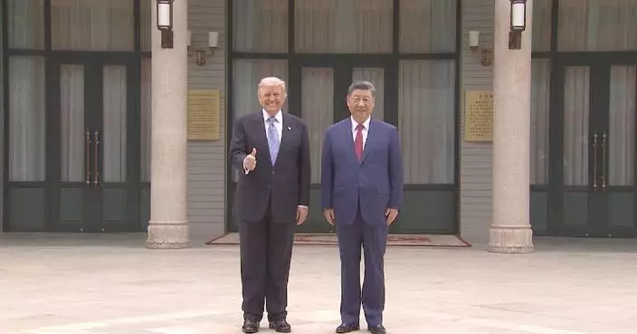 Xi, Trump have private meeting in Beijing