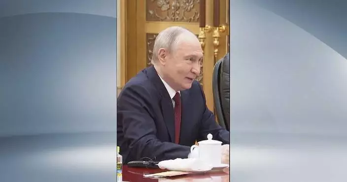 Putin says Russia ready to work with China to build more just, democratic world order