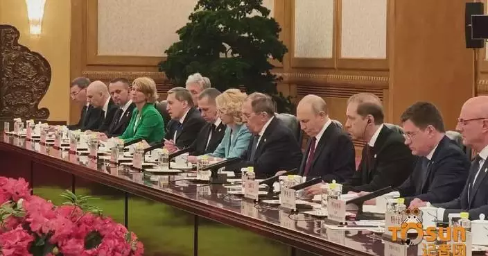Putin vows to strengthen bilateral cooperation with China