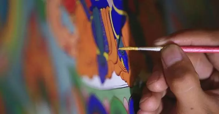Inheritor of Tibetan Thangka inheritor embraces innovation to carry forward age-old tradition