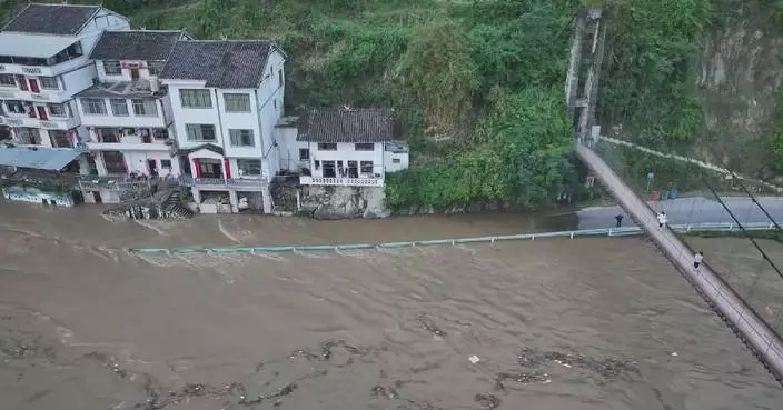 Rain-lashed southern China battles floods as rescue efforts, emergency funds mobilized
