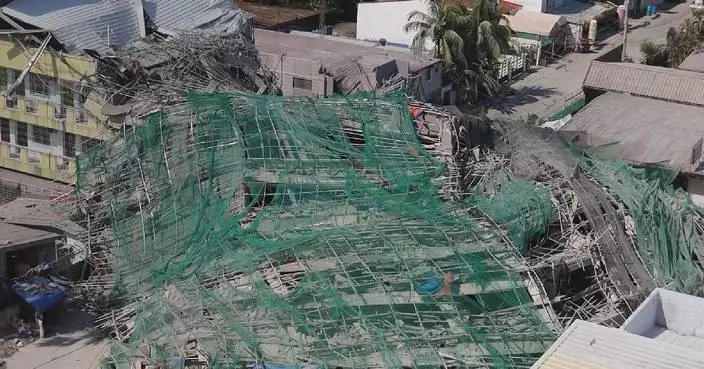 26 rescued from building collapse site in N. Philippines