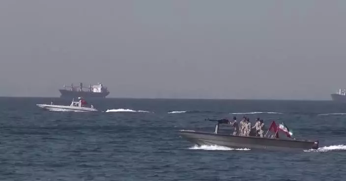 Iran forces fire at 4 ships attempting to cross Strait of Hormuz