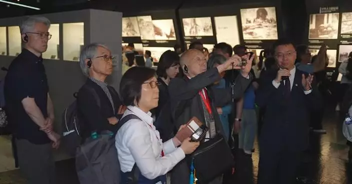 Global scholars visit Nanjing Massacre memorial hall to mark 80th anniversary of Tokyo Trial