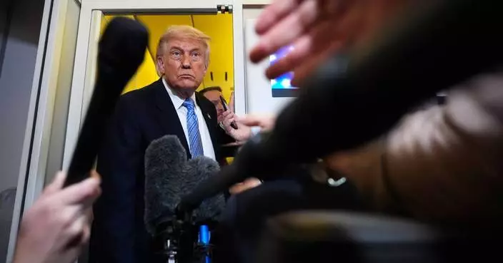 The Latest: Trump heads to a competitive New York district as voters sour on the economy