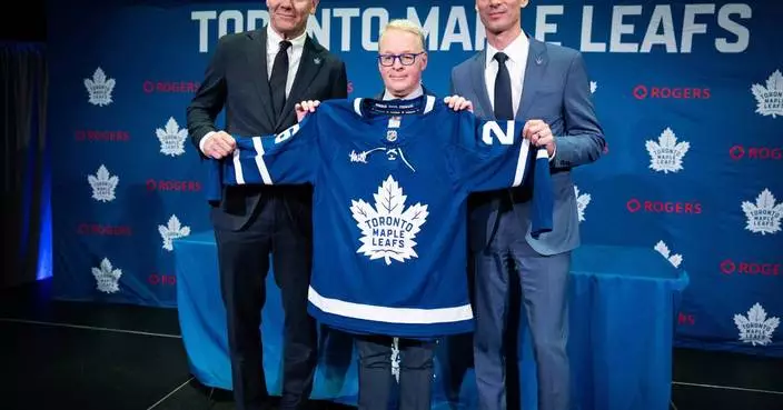 John Chayka faces harsh questions while being introduced as Maple Leafs GM