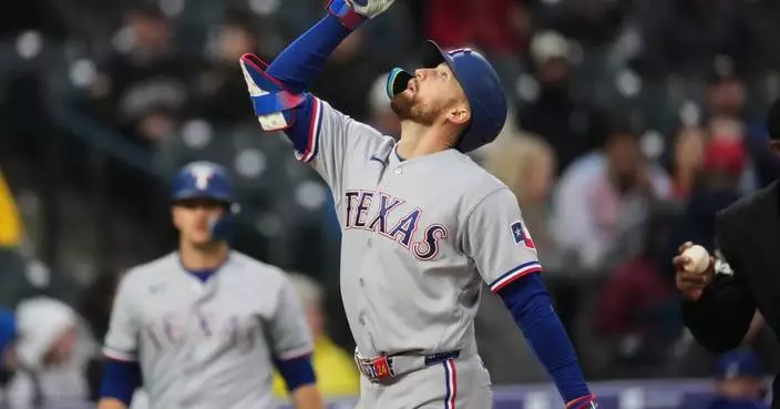 Rocker’s strong outing, Nimmo’s homer, lift Rangers over Rockies, 10-0