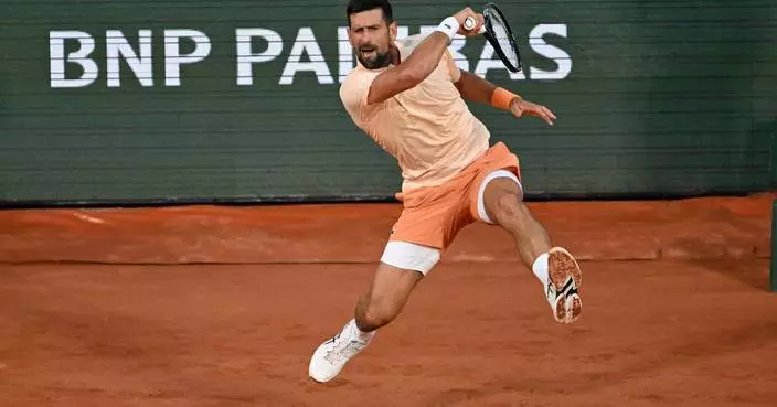Novak Djokovic overcomes a slow start and hostile crowd in 1st-round win at French Open