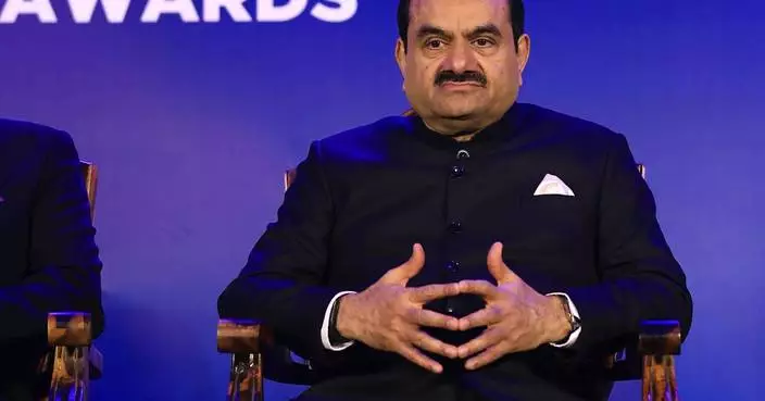 US agrees to settle lawsuit that accused an Indian billionaire of hiding an alleged bribery scheme