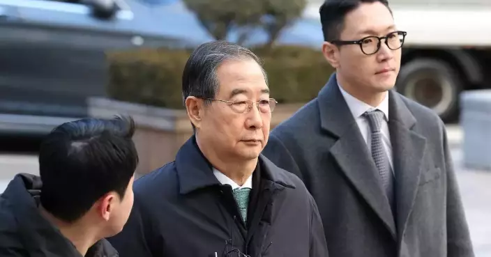 South Korean court reduces prison sentence for ex-prime minister in martial law case