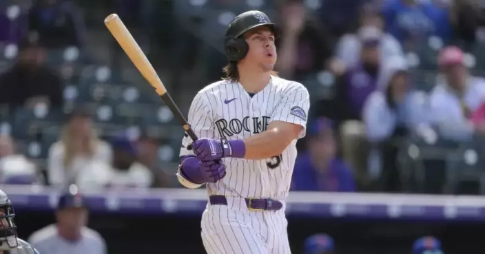 McCarthy hits a grand slam as the Rockies beat the Mets 6-2 to end a 6-game skid