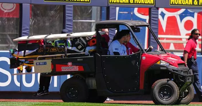 Yankees’ Jasson Domínguez leaves game after crashing into left-field wall catching leadoff drive