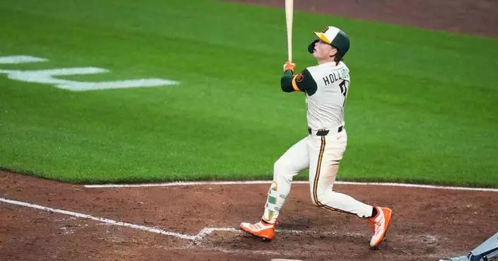 Jackson Holliday’s odd 337-foot homer sneaks under the foul pole in Orioles’ 7-4 win