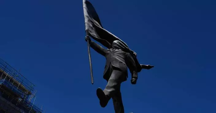Banksy confirms a new statue in central London of a man blinded by a flag is his work