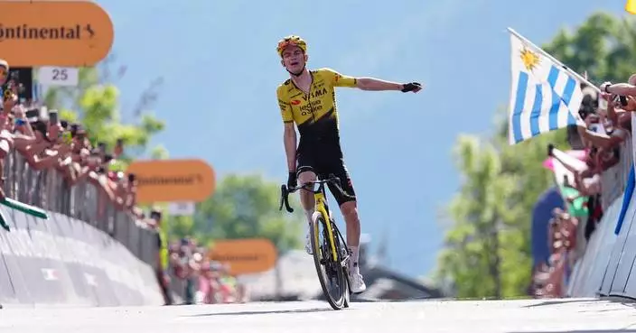 Kuss solos to victory on Giro’s brutal queen stage and Vingegaard stays in pink