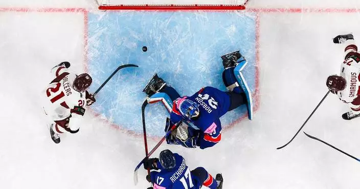 Canada scores 4 in the final period to beat Slovakia 5-1 at ice hockey worlds