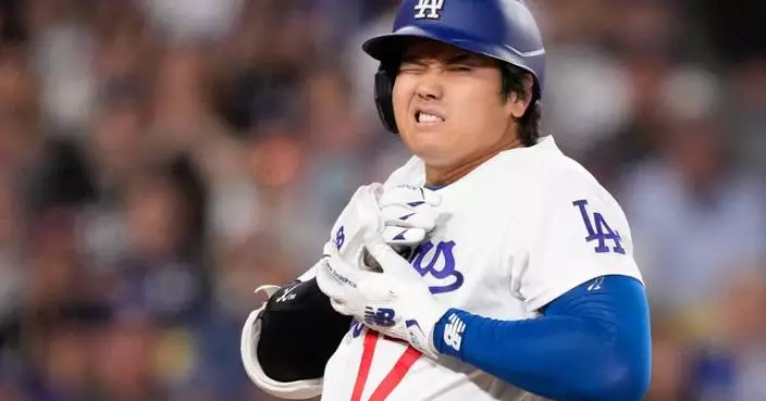 Dodgers’ Shohei Ohtani hit on the hand by a pitch, exits game against the Rockies