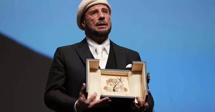John Travolta surprised with honorary Palme d'Or at Cannes Film Festival