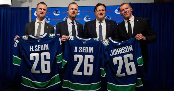 Canucks hire Ryan Johnson as GM, Sedin twins to share president of hockey operations