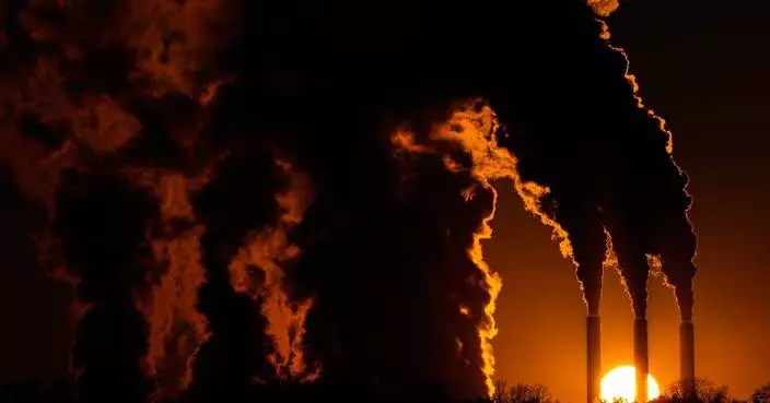 Climate report says world won’t get as hot as feared but will pass warming limit