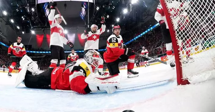 US beats Germany 4-3 in shootout at ice hockey worlds, Switzerland and Sweden win big