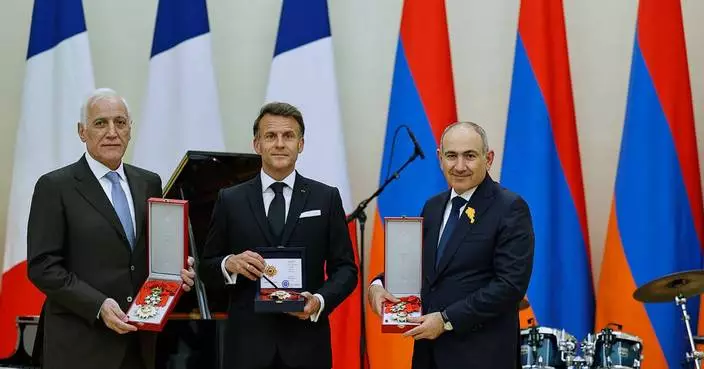 Macron croons classic ballads at a state dinner in Armenia for the French leader