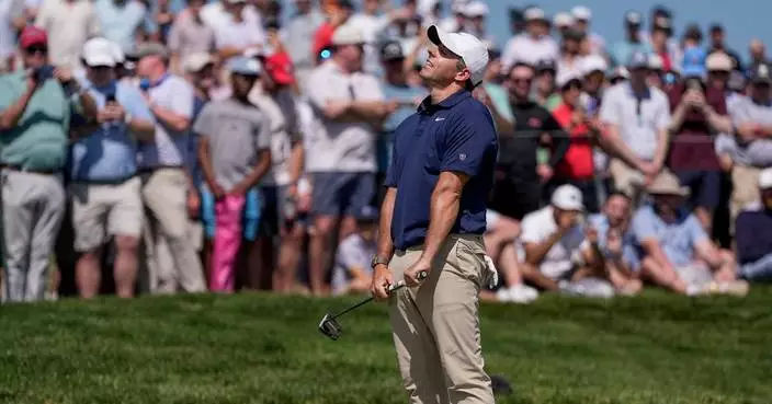 McIlroy has angry exchange with fan at PGA. Rahm, Smith, Schauffele also fade