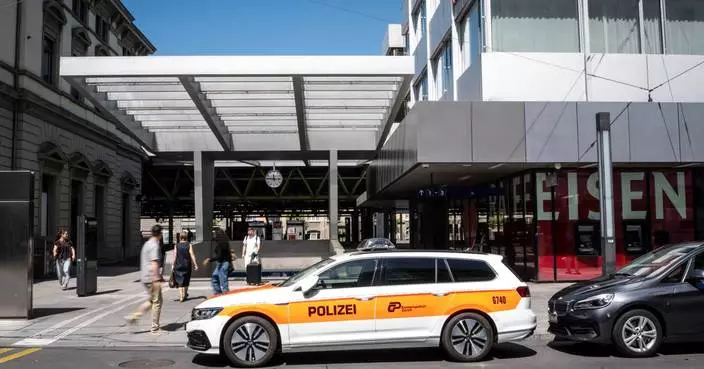 Man stabs 3 people at Swiss train station in what authorities call an 'act of terror'
