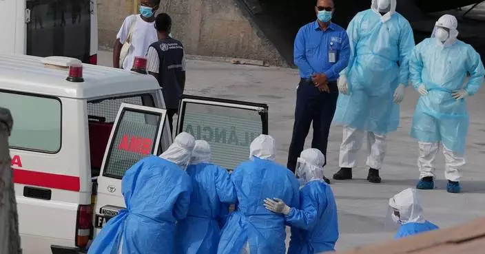 The Latest: 3 passengers from virus-hit cruise ship evacuated to the Netherlands