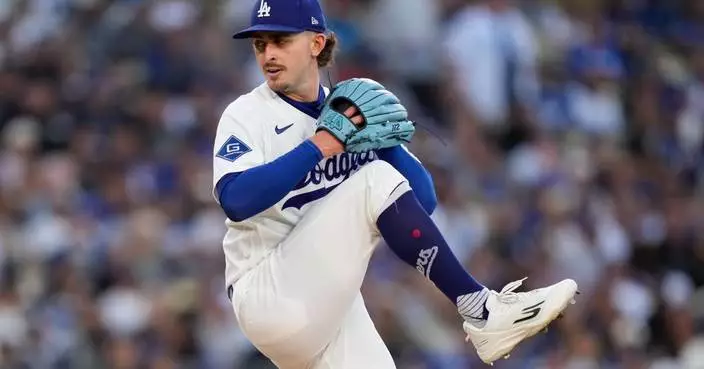 Dodgers beat Phillies as Justin Wrobleski strikes out 9 and Los Angeles hits 4 homers