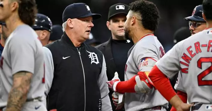 Rafaela homers and drives in four runs as the Red Sox rout the Tigers 10-3