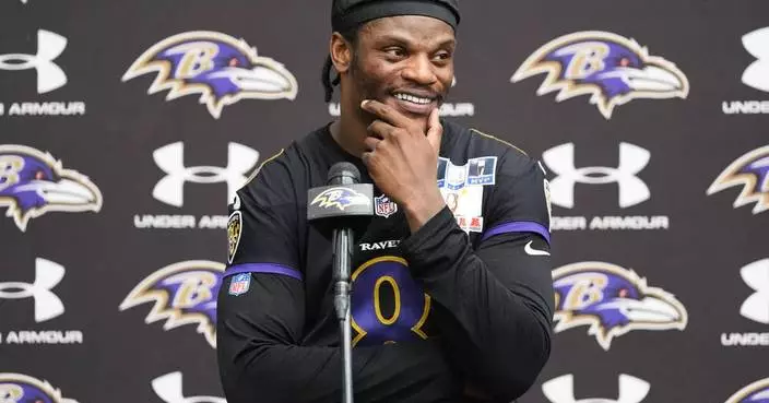 Jackson says he loves Baltimore, but steers clear of discussing his contract with the Ravens