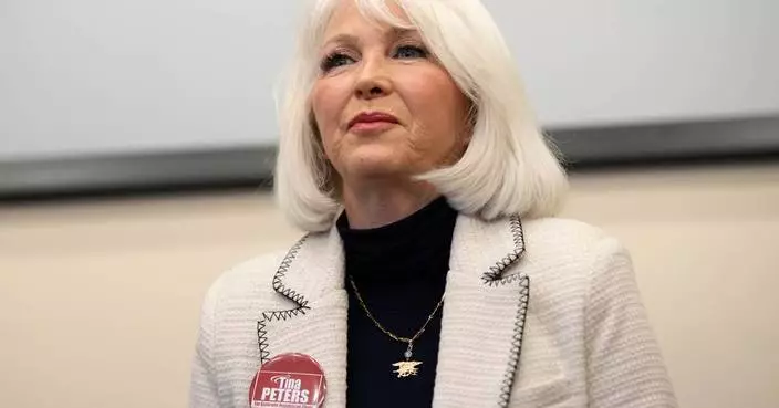Colorado’s Democratic governor commutes ex-election clerk Tina Peters’ sentence after Trump pressure