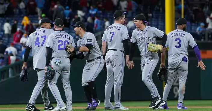 Troy Johnston has go-ahead hit in 11th as Rockies beat Phillies 9-7