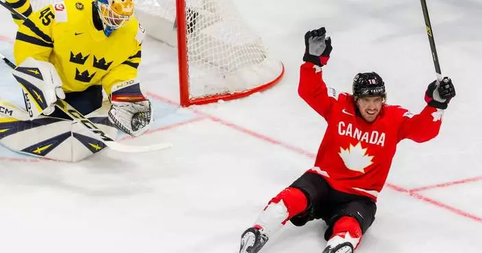 Canada holds off Sweden to open ice hockey worlds