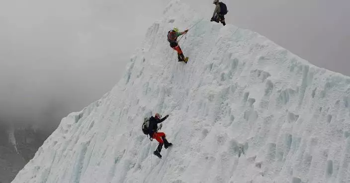 A record 274 climbers scale Mount Everest in a single day