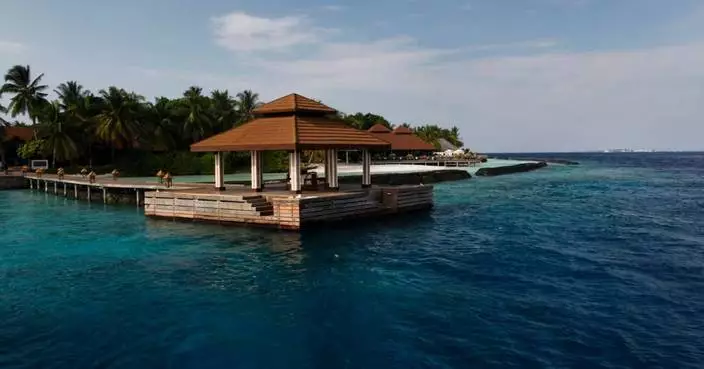 Authorities search waters in the Maldives for bodies of Italians who died in cave dive accident