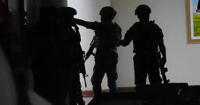 Gunfire breaks out in Philippine Senate where authorities have tried to arrest a senator