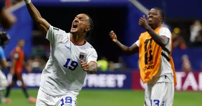 Cape Verde faces Spain in its first World Cup, and other highlights from Monday games, in photos