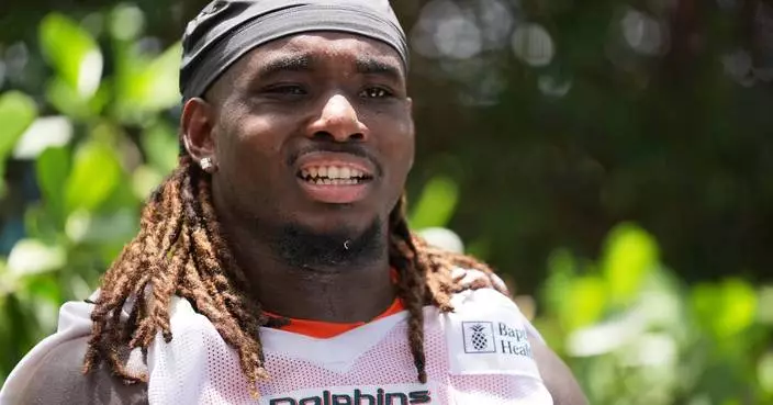 Dolphins agree to a 3-year extension with center Aaron Brewer, AP source says