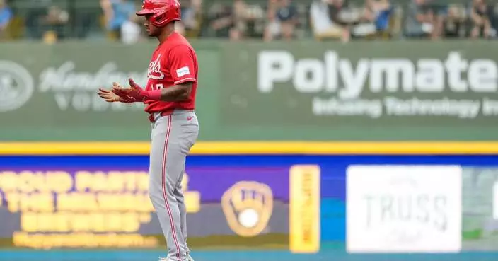 Reds Dane Myers carted from field after crashing into wall
