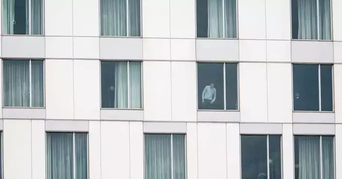 Gunman kills a Montreal officer at a Hilton hotel before being shot dead, police say