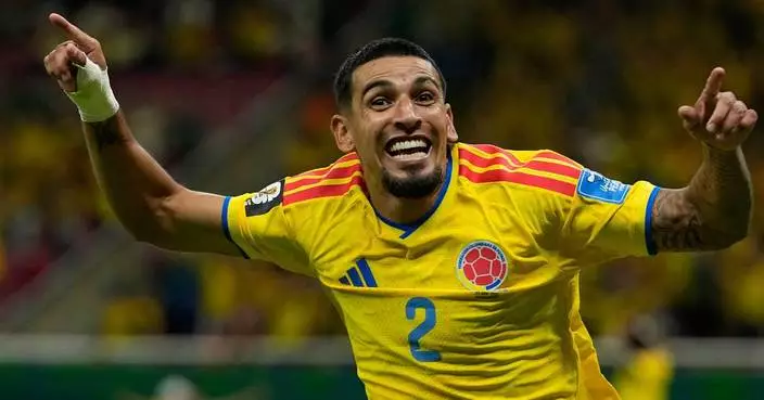 Daniel Muñoz scores and Colombia edges Congo 1-0 to reach the knockout stage at the World Cup