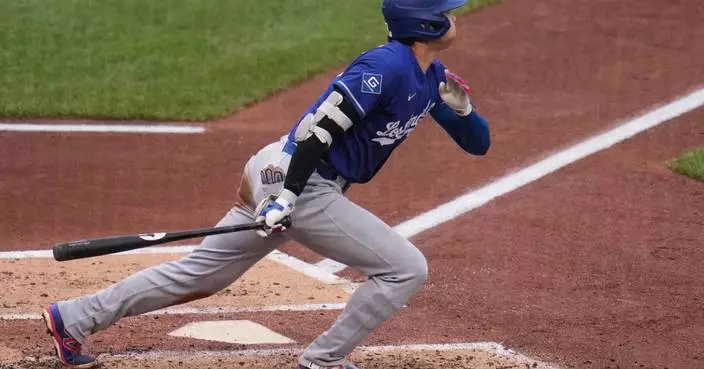 Ohtani homers, leaves game with left knee inflammation in Dodgers’ 8-6 win over Pirates