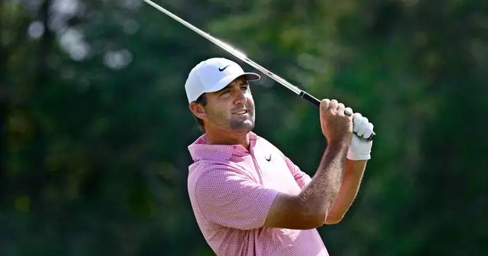Scheffler makes clutch putt to force Monday playoff against Hovland in Travelers Championship