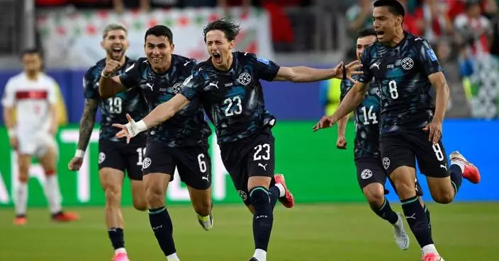 Paraguay beats Turkey 1-0 at the World Cup despite being down a man to clinch Group D for U.S.