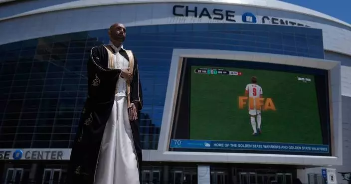 In a rainbow-trimmed robe at the World Cup, a gay Qatari doctor advocates for equal rights