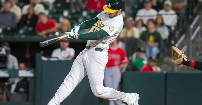Heim's pinch-hit HR in 9th helps A's complete huge comeback for 12-11 win over Angels in 10 innings