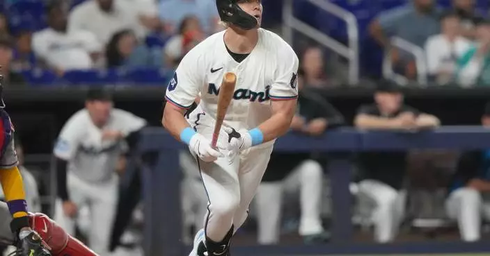 Marlins break game open with 4 runs in the 8th, beat Diamondbacks 10-6