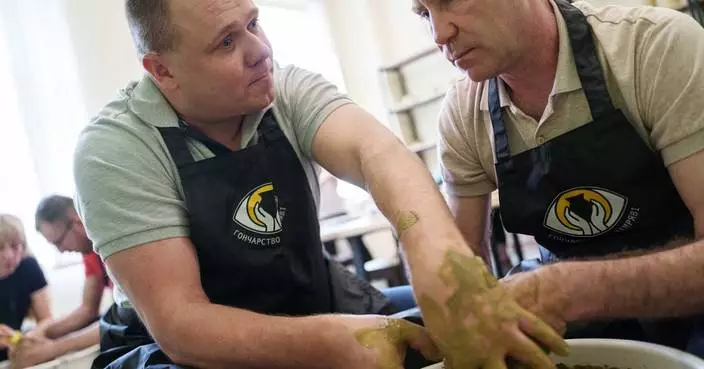 A blind Ukrainian veteran turns pottery into a business and mentors others